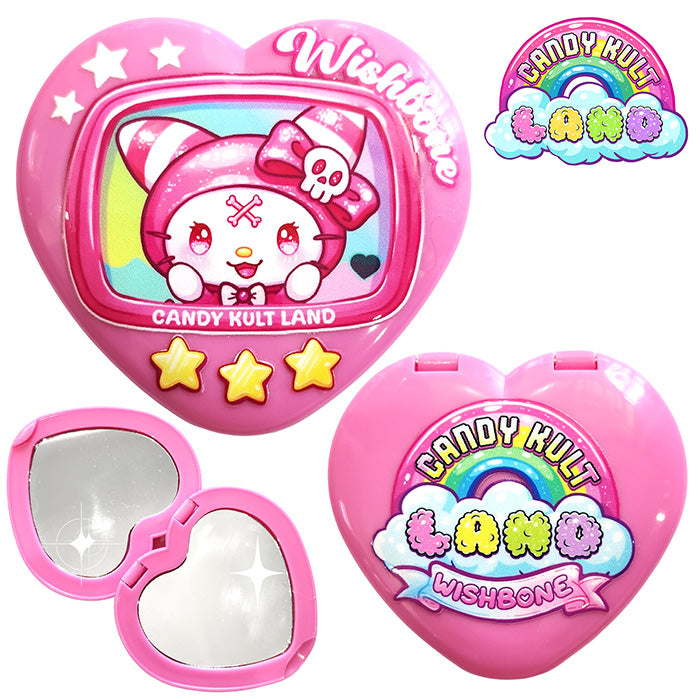 Wishbone Tamagotchi-style compact mirror from Candy Kult Land with retro 80’s-90’s design and functional mirror.